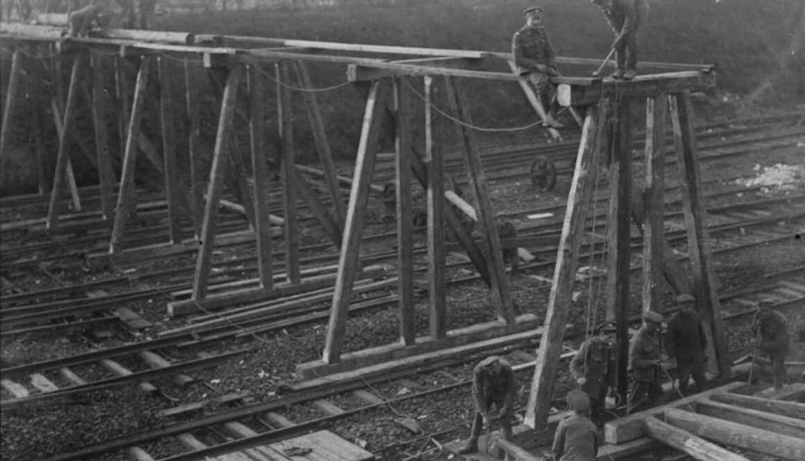 264_Canadian Engineers building a bridge across railway. October, 1918.